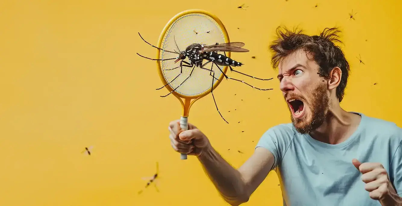 Electric fly mosquito zapper eco friendly pest control. Man swatting insects with a yellow racket